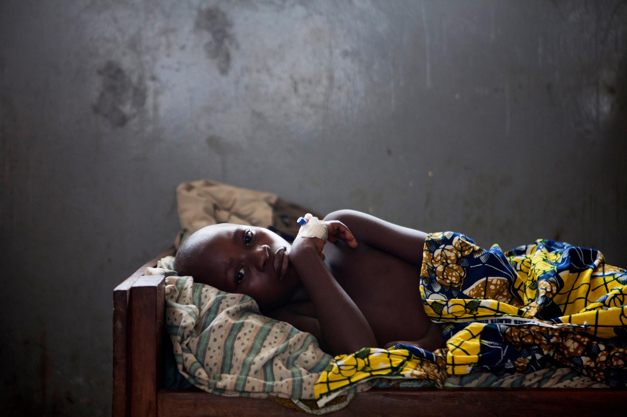A Ten-year-old boy awaiting evacuation at a hospital in the Democratic Republic of the Congo’s North Kivu province.