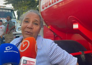 “No fue bonita la experiencia”: Vecina cuenta cómo vivió el incendio que consumió el almacén de Prodacom en Santiago