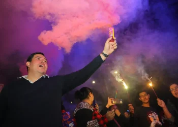 Activistas del partido de Gobierno protestan en Honduras coreando «no al fraude» electoral