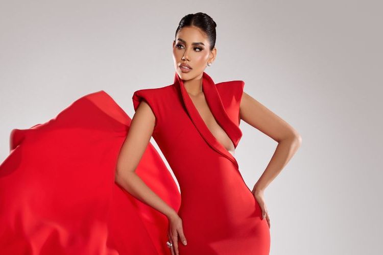 Oriana Falla deslumbra con diseño de Suzelle Taveras en impactante vestido rojo