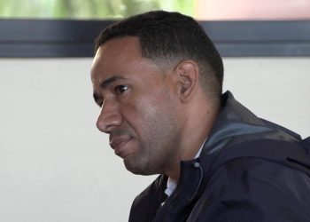 Condenan a 30 años a comerciante por matar a hombre de 10 disparos frente a sus hijos en Santiago